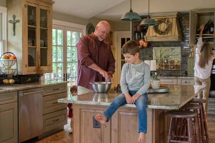 Family gathering in open-concept living space in Purcellville, Virginia home