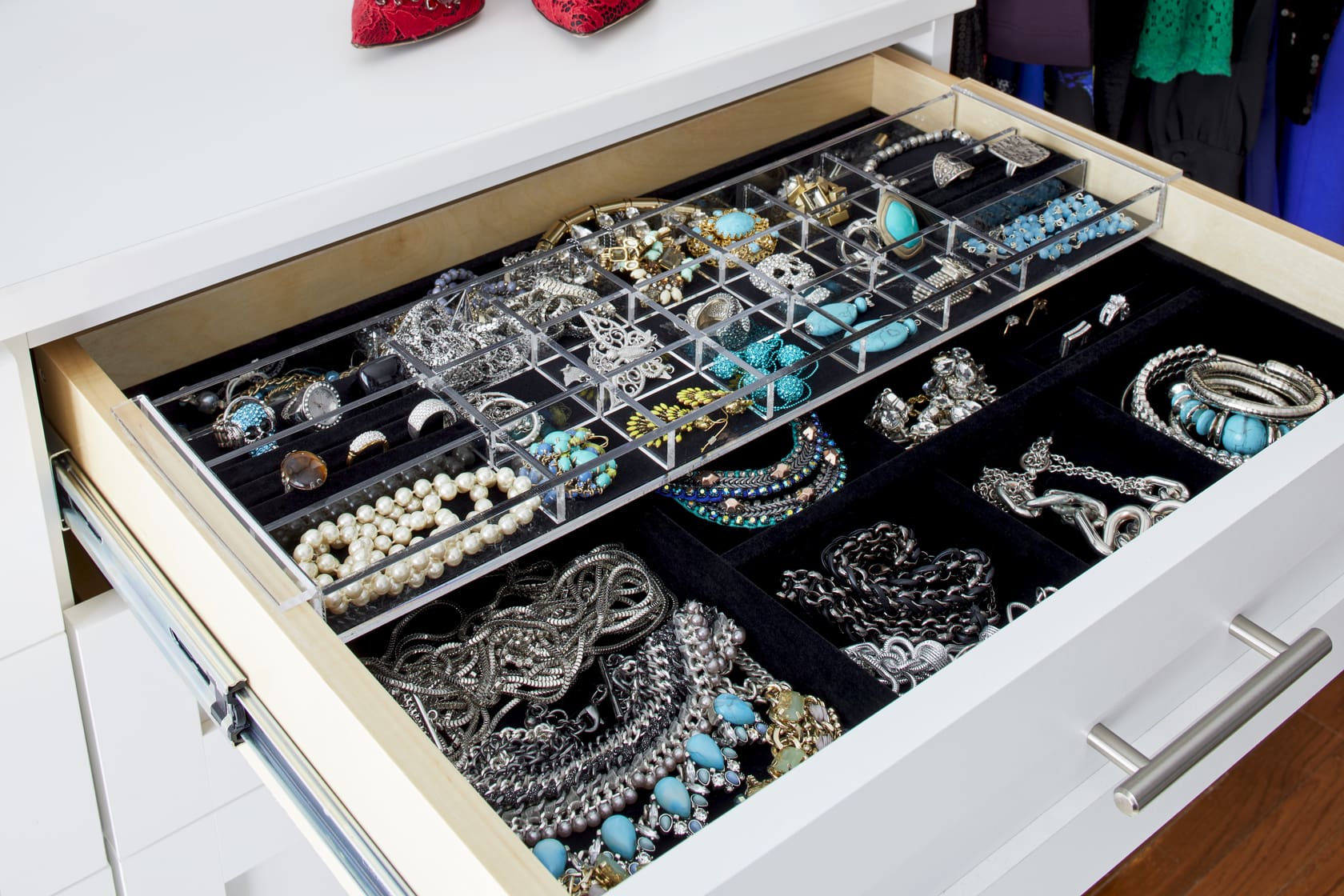 Jewelry drawer with custom compartments in a luxury closet system in Leesburg Virginia custom home