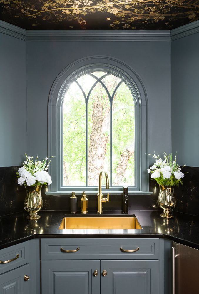 Material-driven design takes center stage—arched architecture, unlacquered brass, and stone chosen for longevity, not trend.