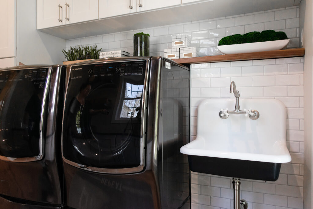 Custom mudroom with laundry center and cabinets in Northern Virginia home