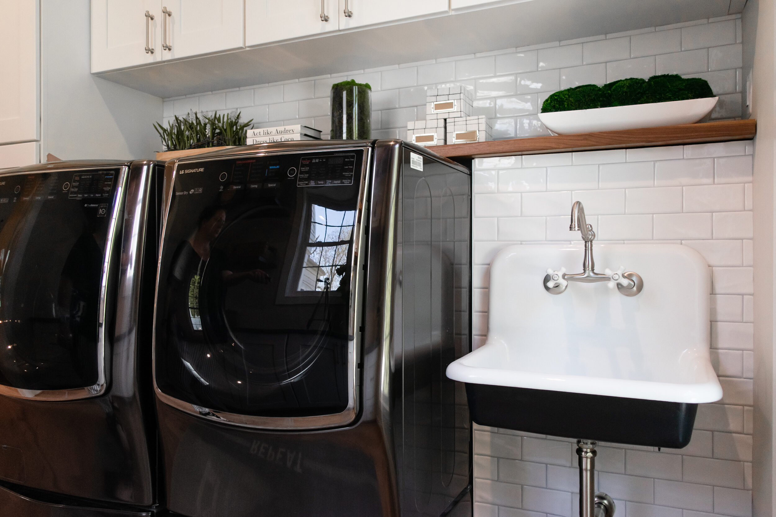 Custom mudroom with laundry center and cabinets in Northern Virginia home