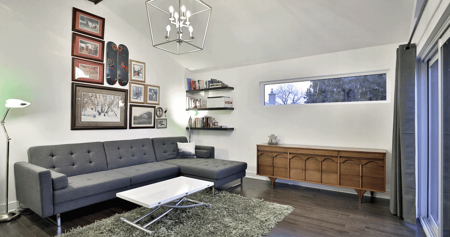 modern living room with furry rug green lamp and midcentury modern furniture