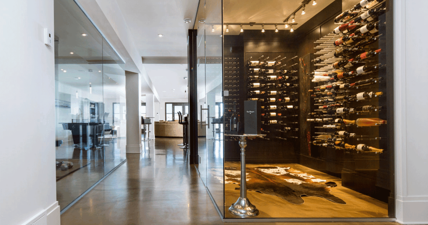luxury wine room with glass wall to peek at invisible wine shelves