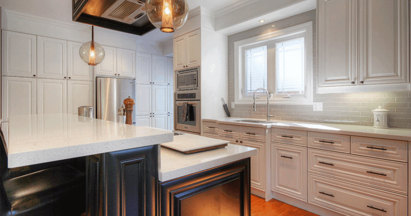 custom kitchen with floor to ceiling cabinetry and white subway tile backsplash