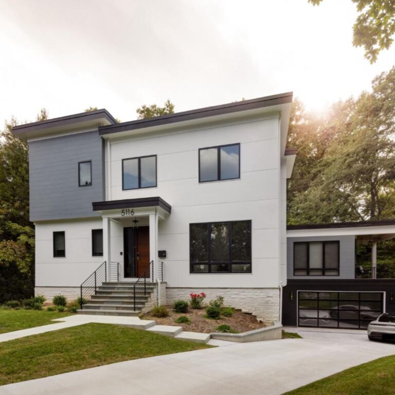 exterior of a custom modern home with a two car garage