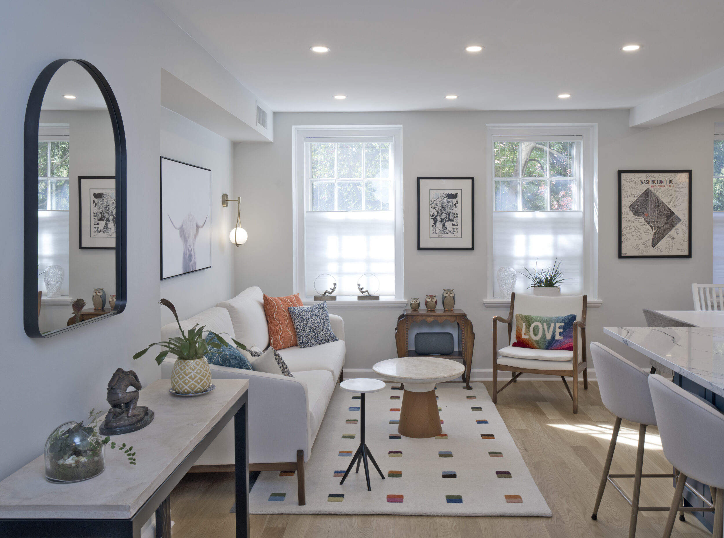 Living room with a couch, chair and coffee table.