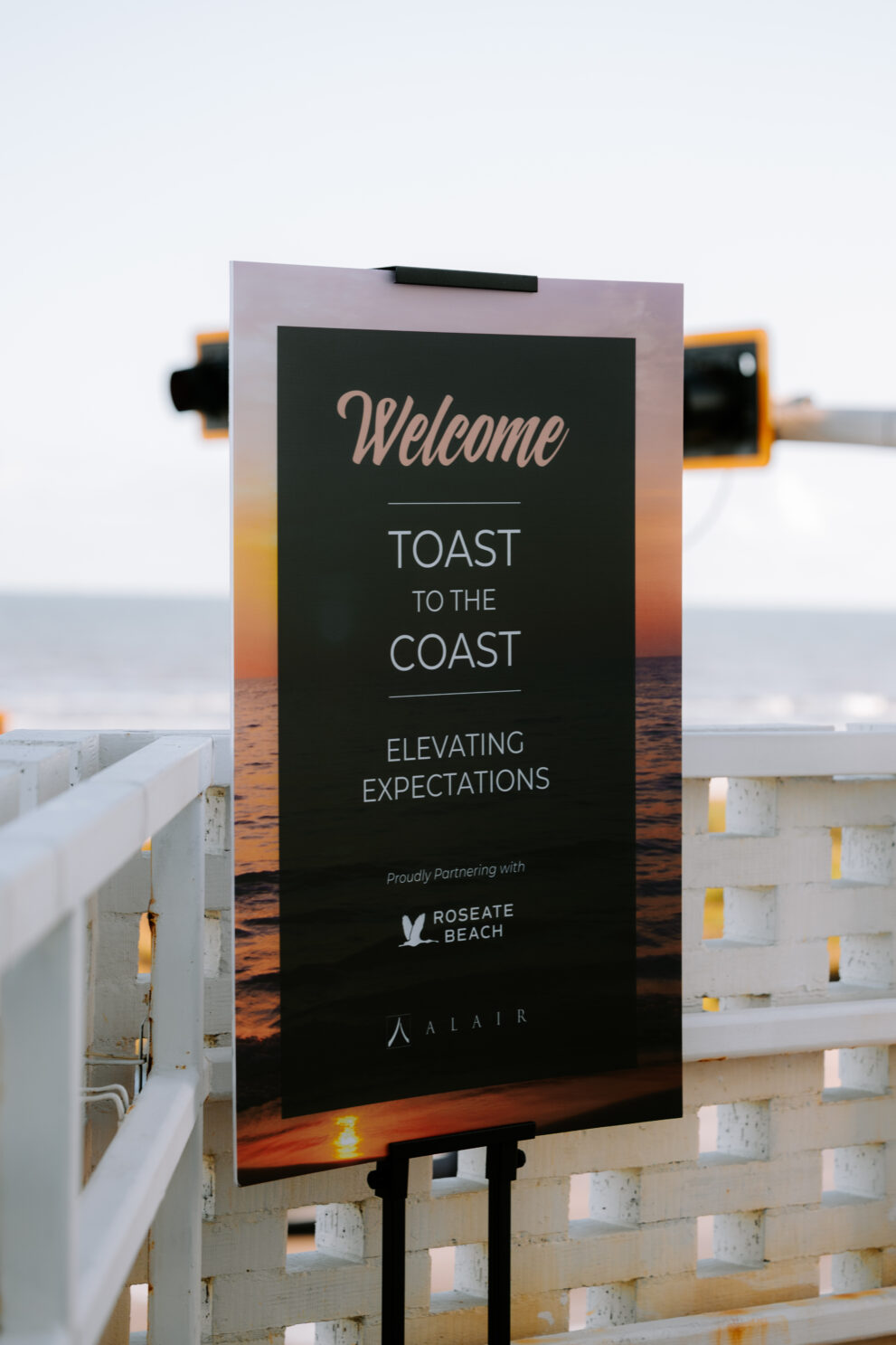 Sign on the coastal launch party that says, 