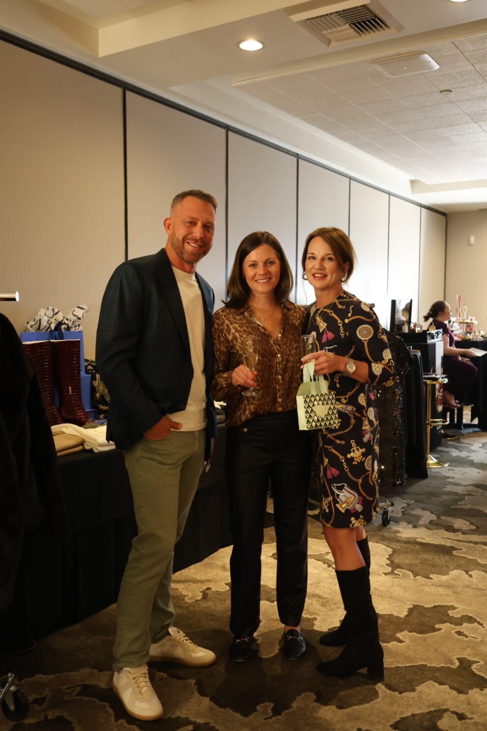 a photo of Stacy Eakman of Alair Homes Kirkland, Beth Gale, Director of Business Development and Amy Andrews of Pinstripe Wines attending Industry Appreciation Night at Jocovine Bistro in Bellevue