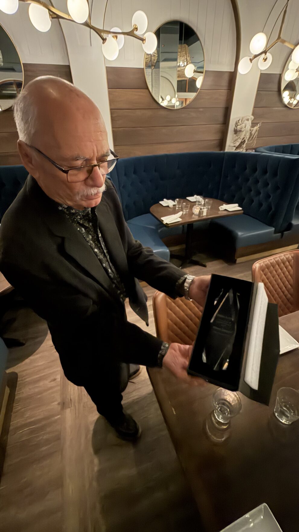 Albert Donadio of Alair Orillia admires his Young Guns and Legends award.