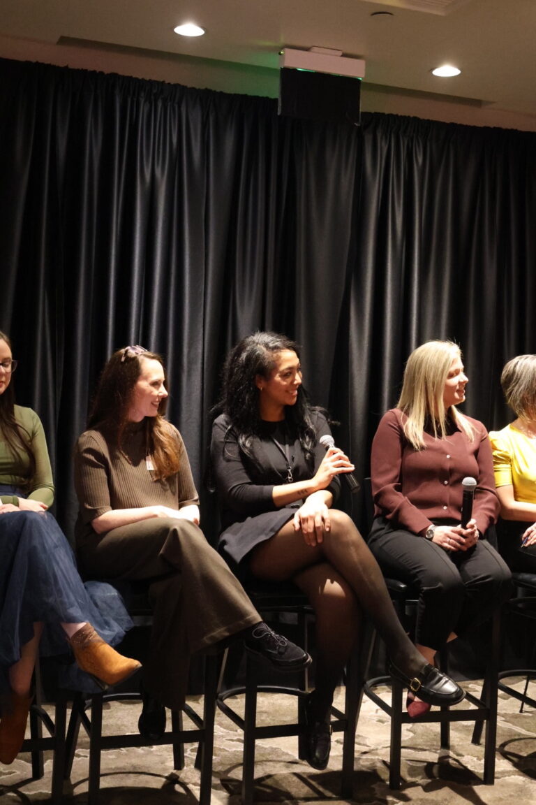 a close-up photo of a panel of women who were invited to speak at the Women of Influence Event at Overlake Golf & Country Club in November of 2025 | hosted by Alair Homes Kirkland