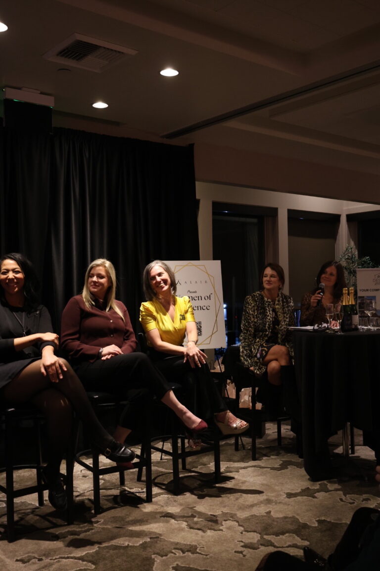 a close-up photo of a panel of women answering questions, they were invited to speak at the Women of Influence Event at Overlake Golf & Country Club in November of 2025 | hosted by Alair Homes Kirkland