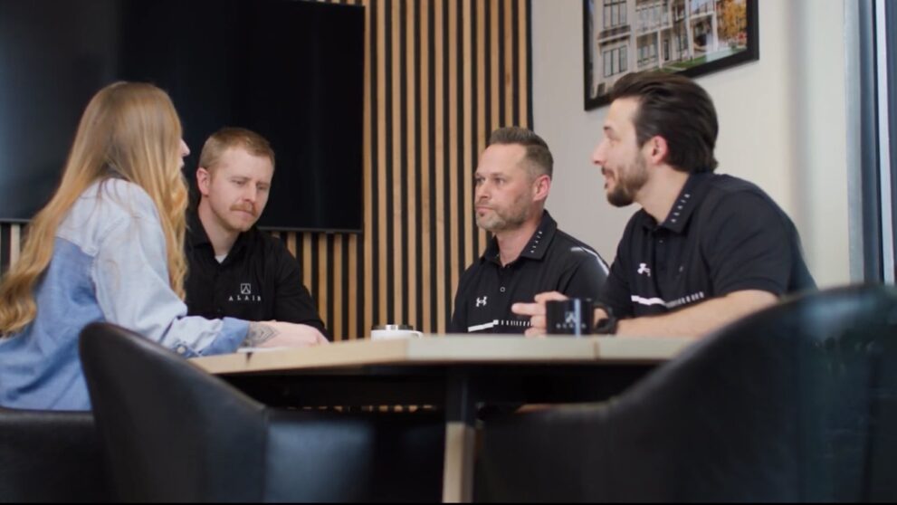 Alair Homes Red Deer team meeting with clients during custom home planning consultation in Central Alberta