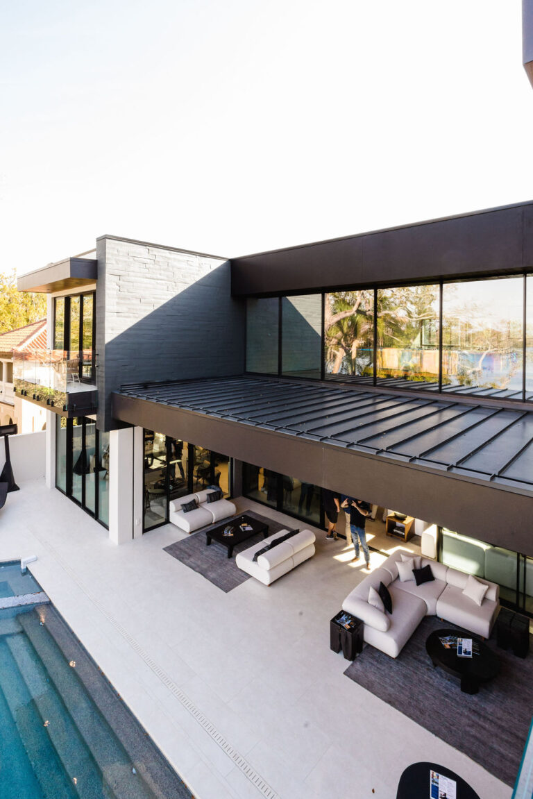 outdoor living space and pool at the new american home in Winter Park, Florida | Alair