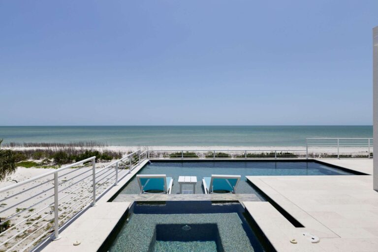 Beautiful Beach Front View from the back porch of a stunning Alair Custom Home in Sanibel